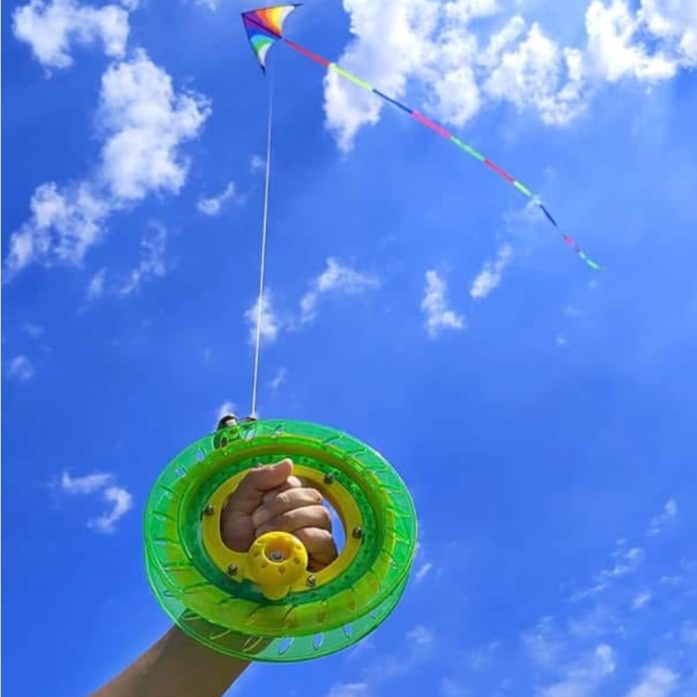 Colorful Kite Reel with 1,000 ft of line & lock.